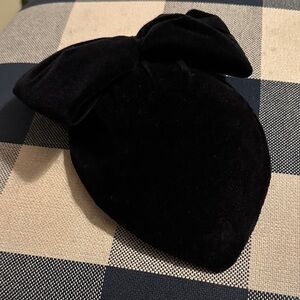 Madcaps Black Strap-On Bow Hat